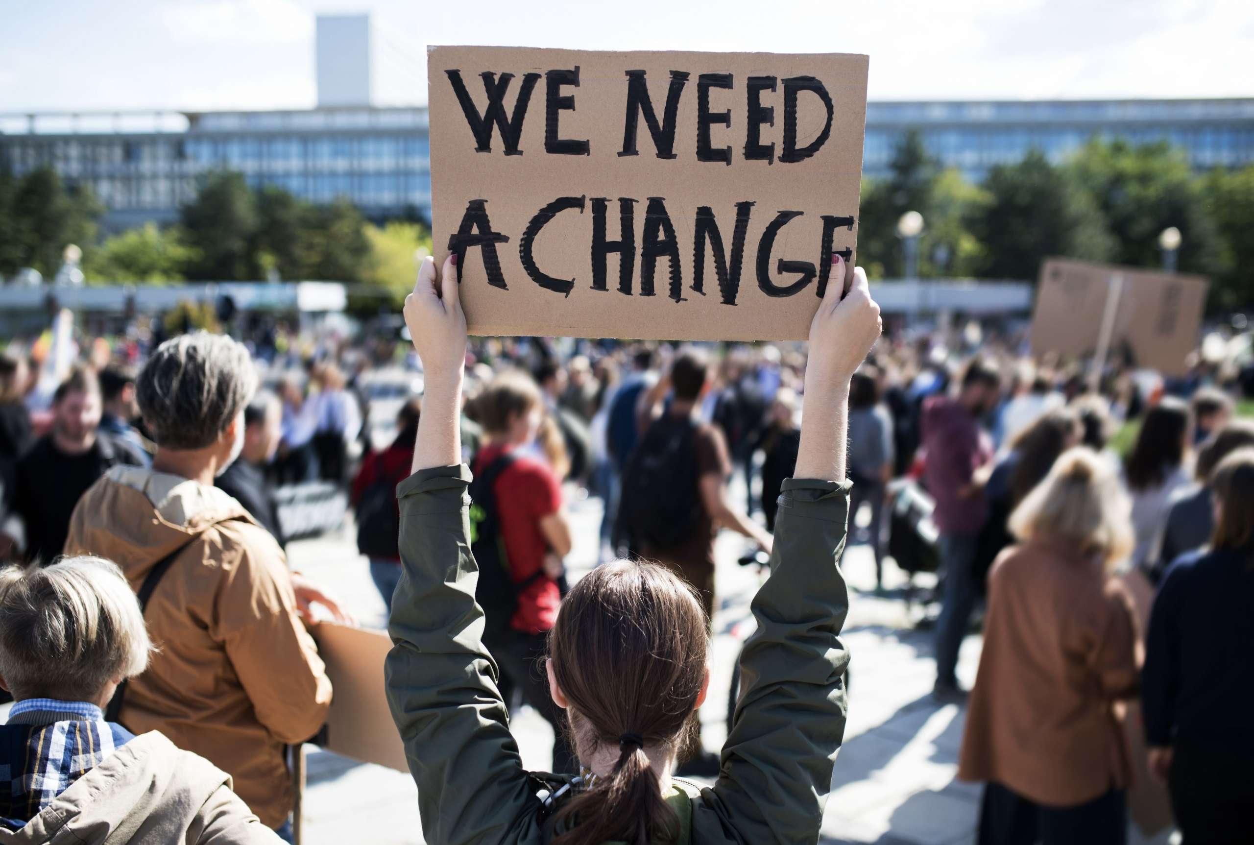 Person holding sign at social protest